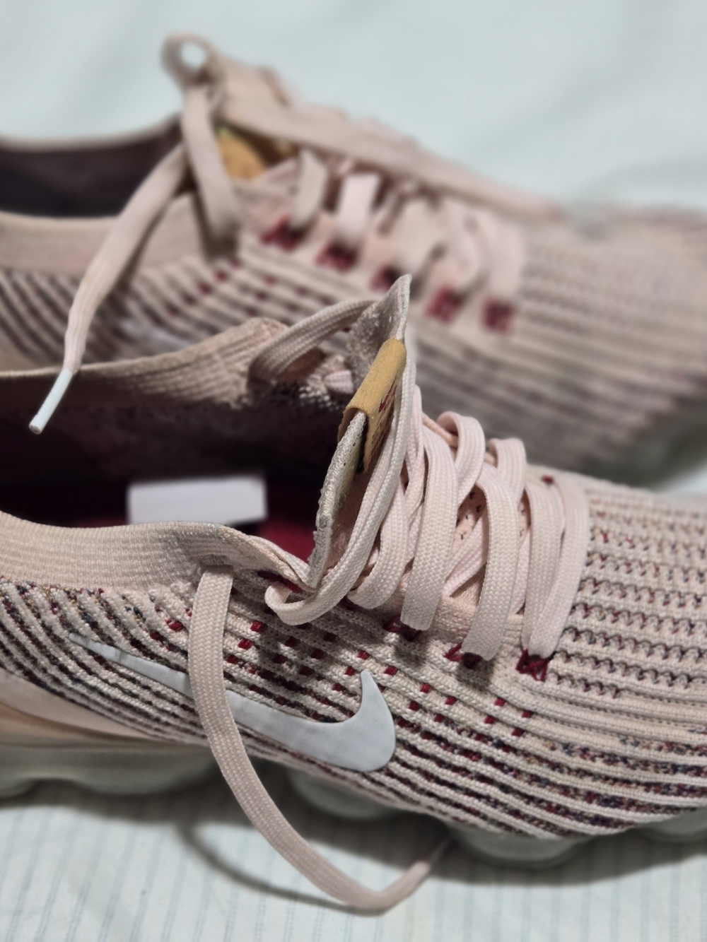 Nike Women's Blush Pink Knit Running Sneakers with White Swoosh